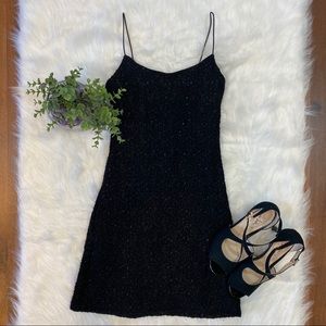 Black sleeveless dress by Byer Too! California